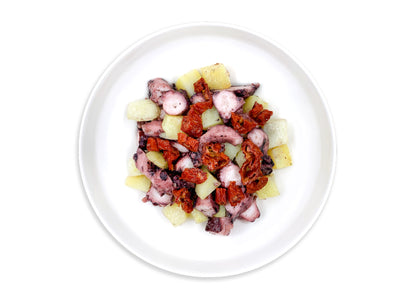 Polpo con patate e pomodori secchi